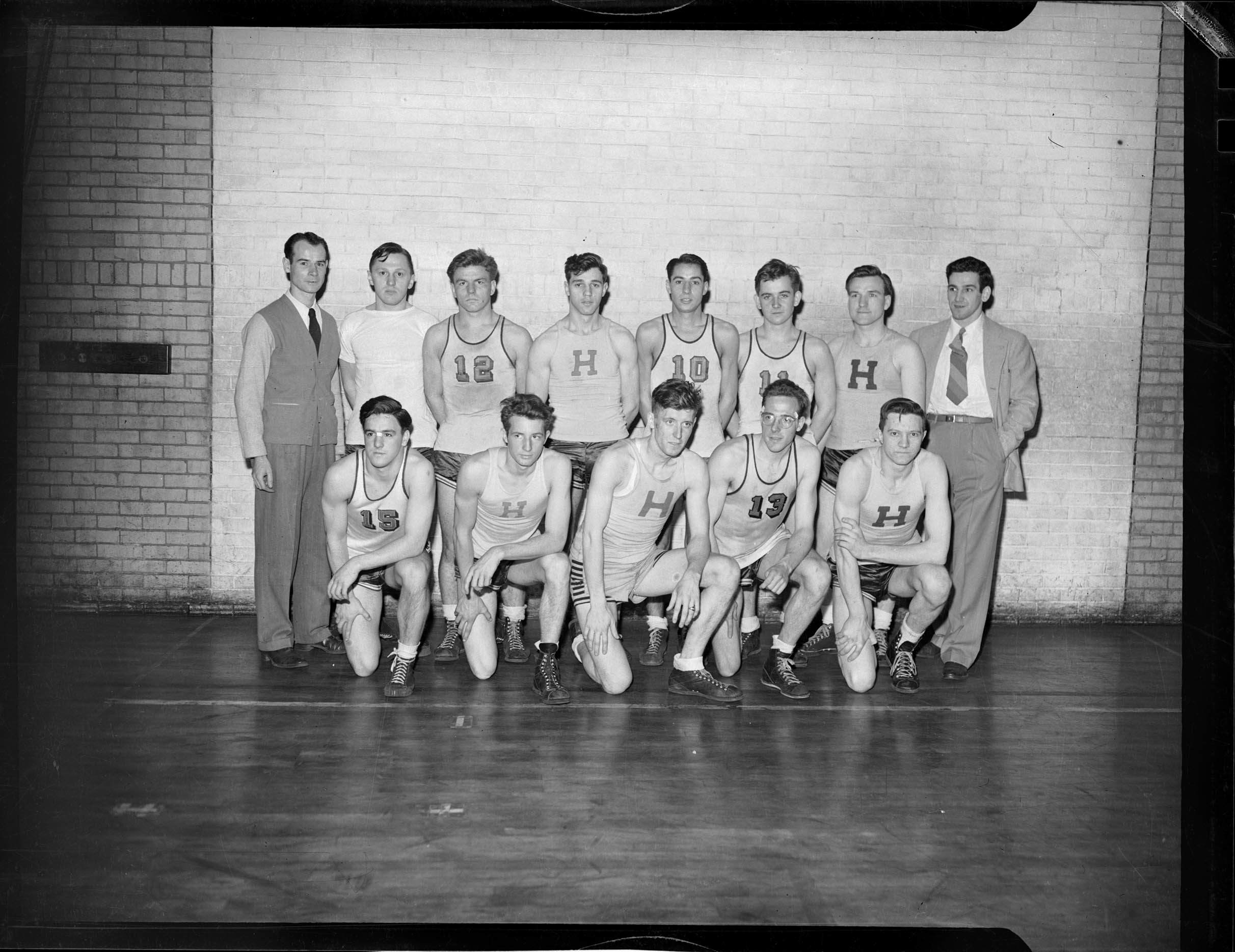 Group portrait of Felkar Club basketball team, including several