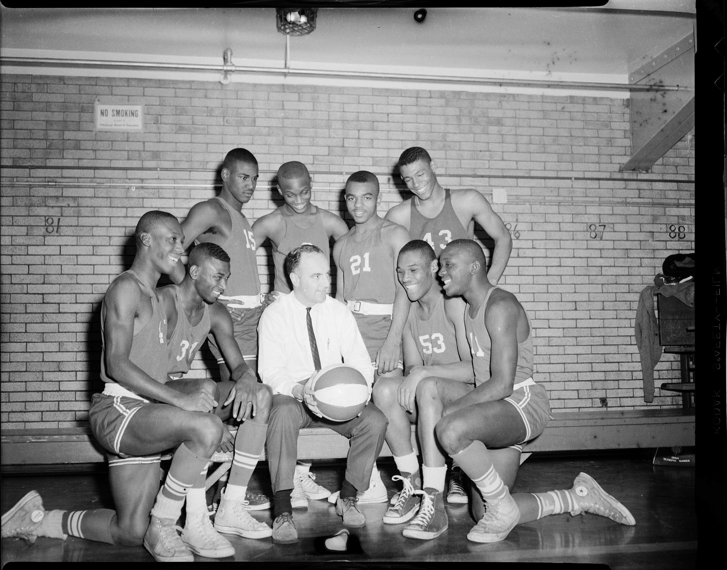 Fifth Avenue High School basketball team, kneeling from left Clarence