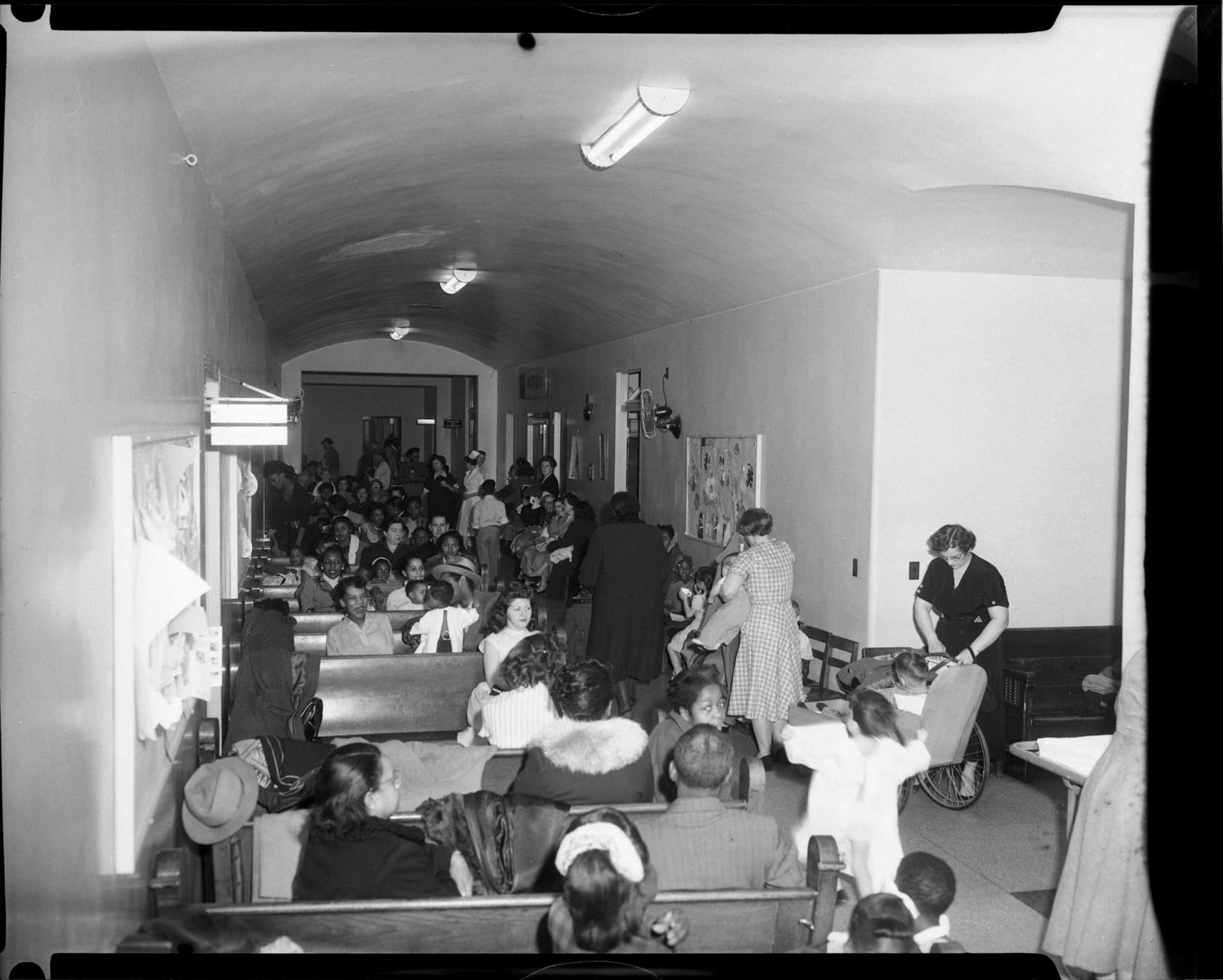 Patients, including wheelchair patients, in hospital waiting area
