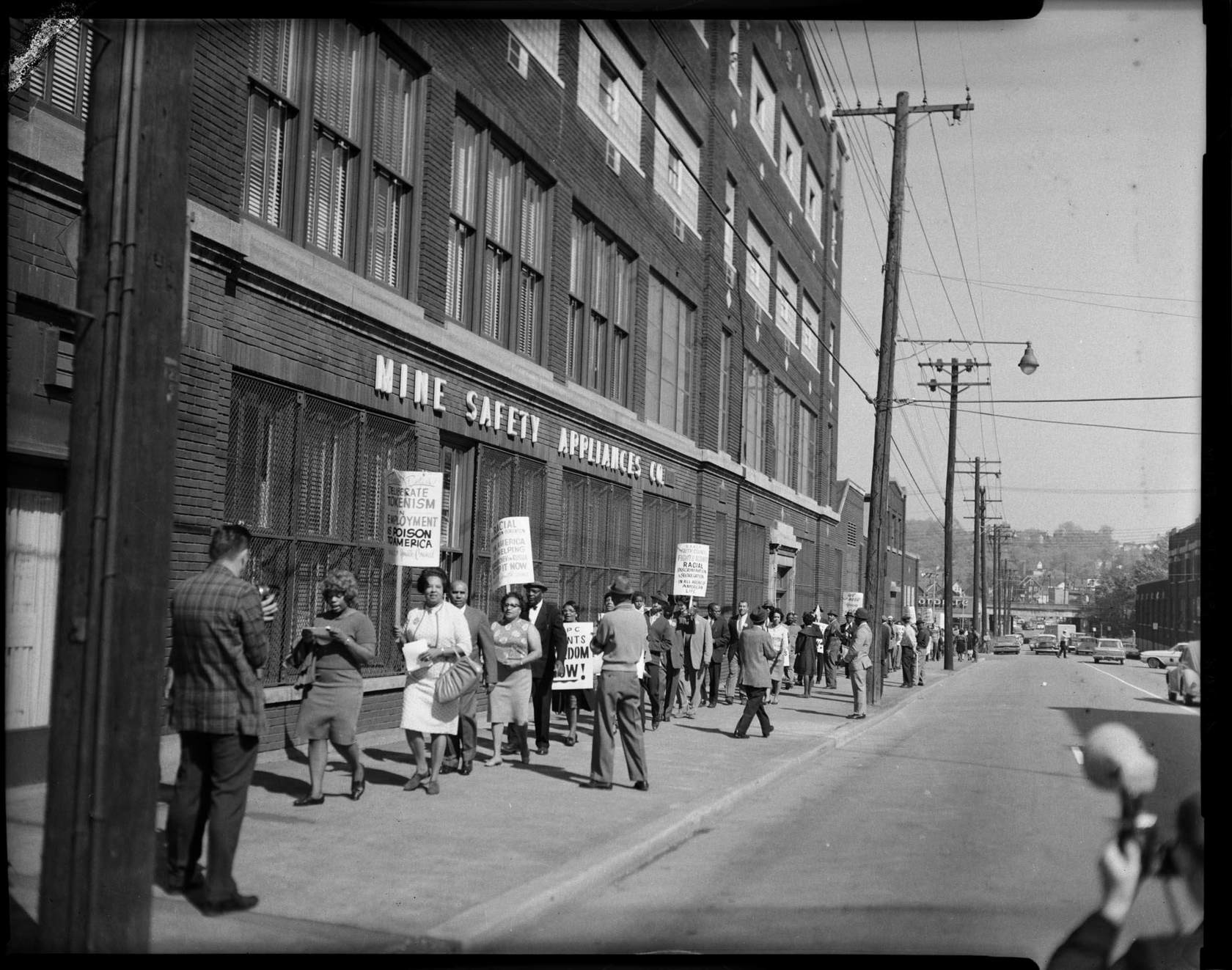 NAACP Protesters carrying signs protesting employment discrimination