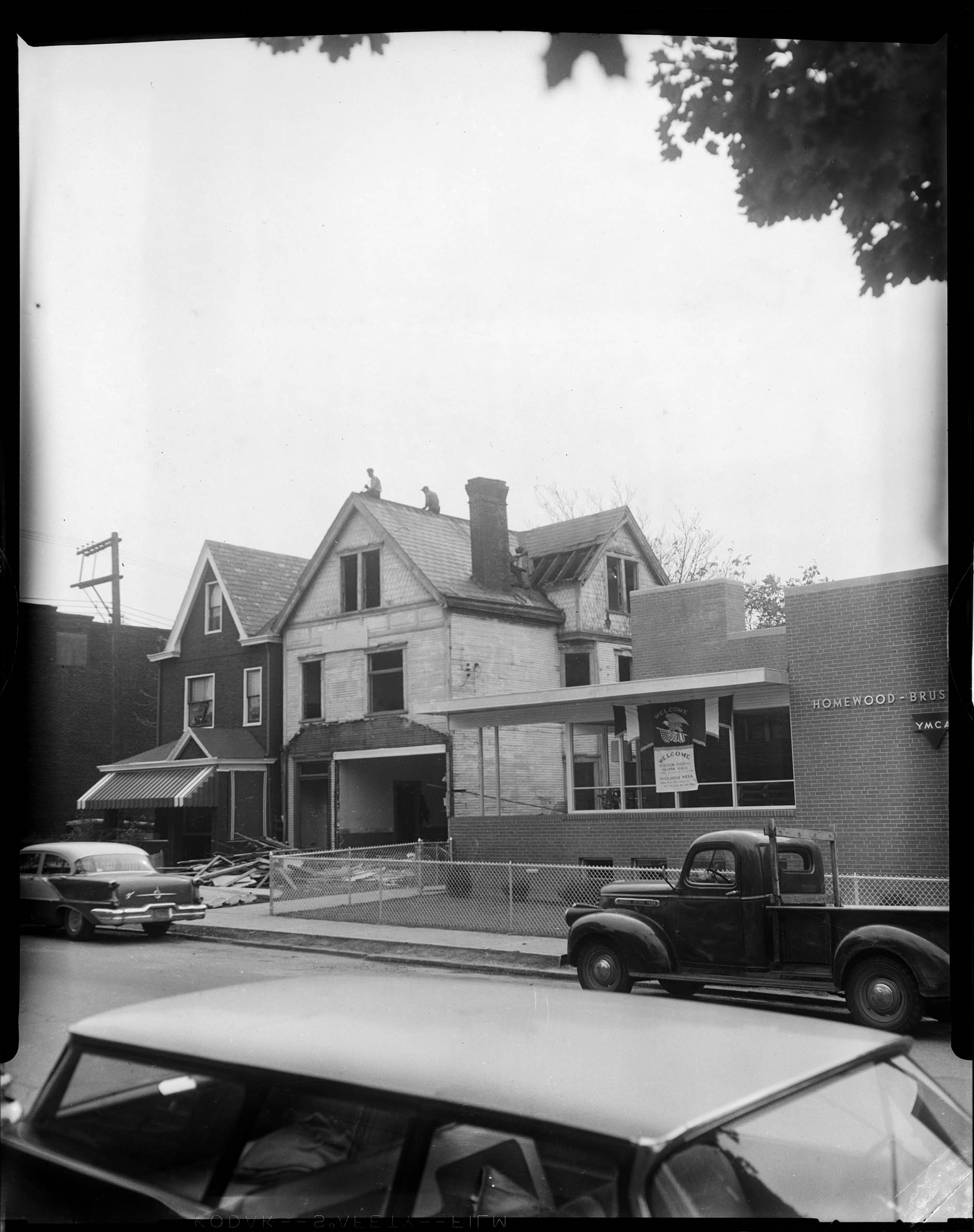 Corner of old HomewoodBrushton Branch YMCA being razed, with new