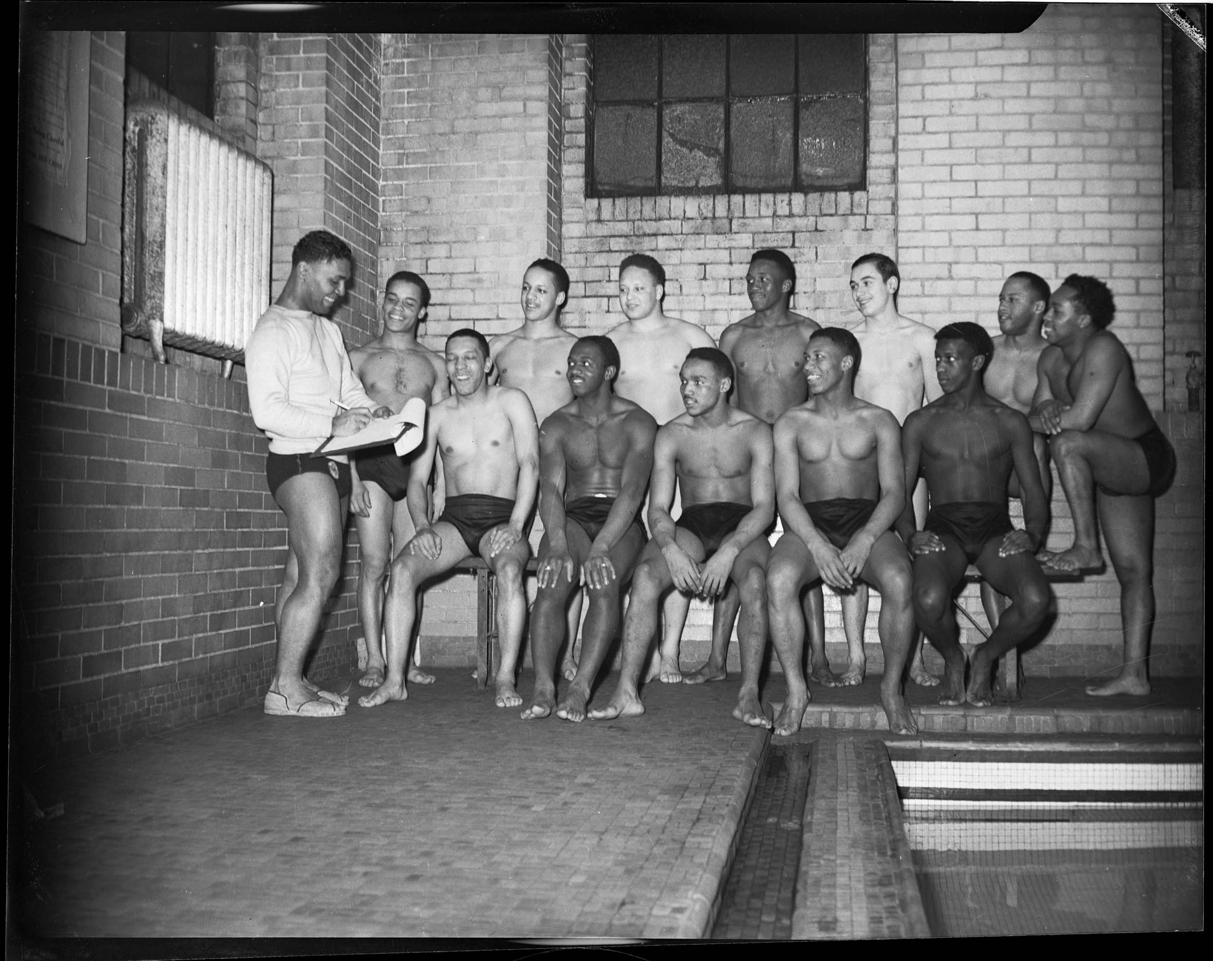 Centre Avenue YMCA swimming team with coach Fountain on left, and