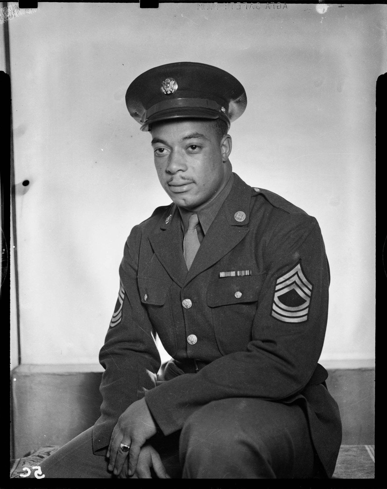 Three quarter portrait of James “Jim” Dorsey wearing dark U.S. army
