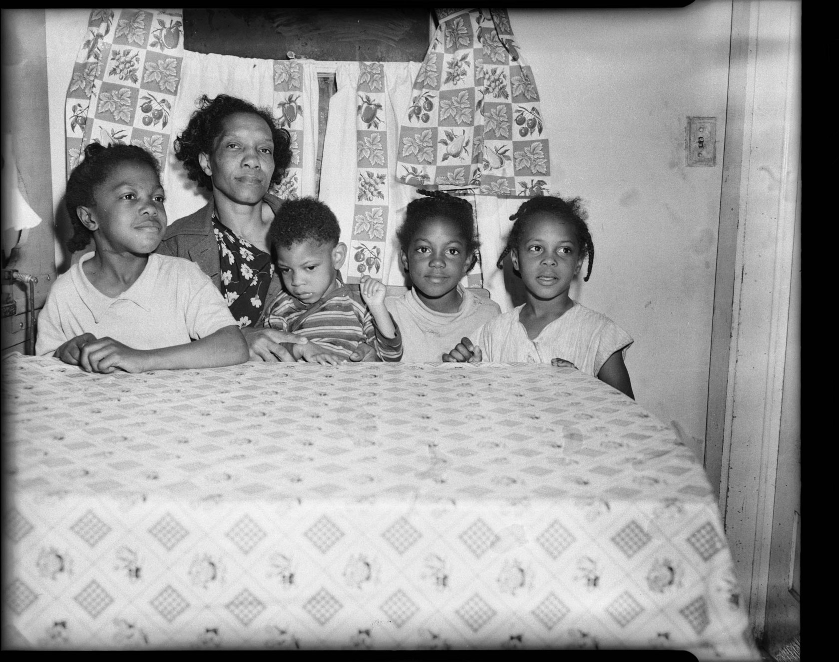 Vivian Jones, mother of murder victim Raymond Jones, posed with four of
